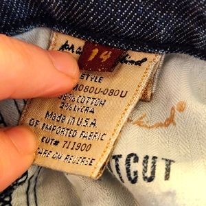 7 famk boot cut jeans. Size 14.